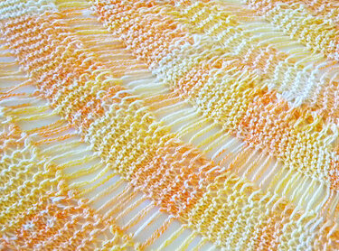 Half circle shaped shawl knitting pattern "Au coucher du soleil"