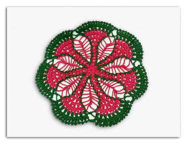 Rundes Häkelmotiv in Grün und Rosa mit sternförmigen Blütenblättern und offenem Spitzenmuster