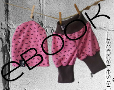 Rosa Puppenmütze und Puffhose mit kleinen Blumenmustern und braunen Bündchen in Detailansicht