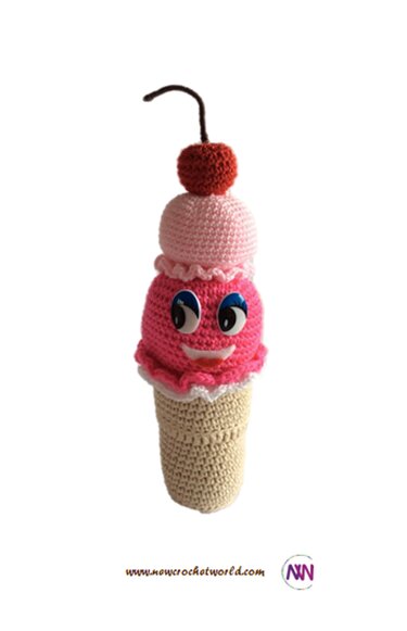 Gehäkeltes Amigurumi-Eis in Rosa und Pink mit Gesicht und Kirsche