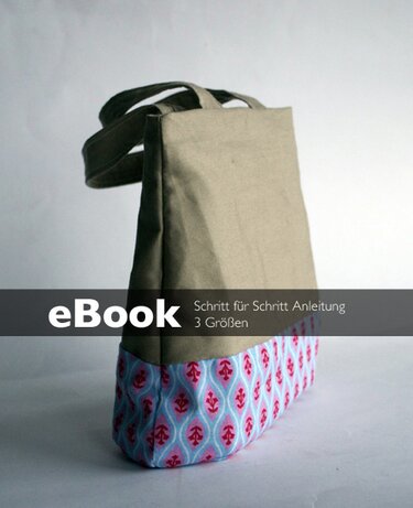 Beispiel einer zweifarbigen Einkaufstasche mit dem Schriftzug 'eBook Schritt für Schritt Anleitung 3 Größen'