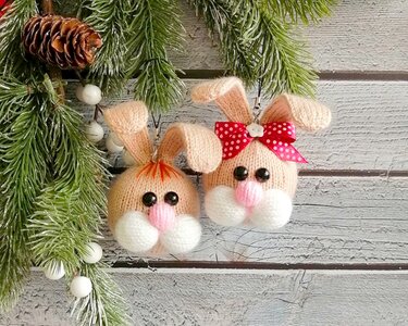 K102 Christmas tree bauble or decoration. Rabbit Girl and Boy Bunny - Knitting