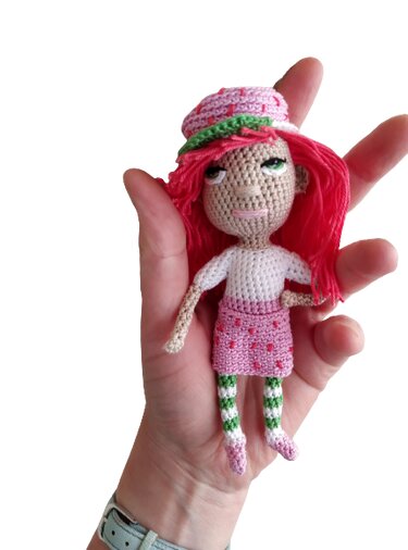 Strawberry doll is wearing a cap - Crochet