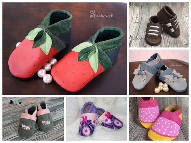Genähte Babyschuhe in verschiedenen Farben und Motiven: rote Erdbeer-Puschen mit Blättern, graue Schuhe mit Schleife, braune Zierband-Schuhe, rosa gepunktete und violette gemusterte Puschen.