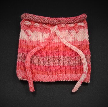 Beutesack des Advents – Adventskalender aus Wollresten stricken