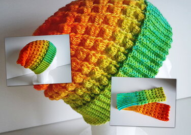 Gehäkelte Slouch‑Mütze mit geripptem Bund und passenden Stulpen in Orange, Gelb und Grün