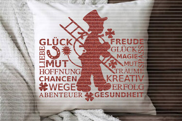 Schornsteinfeger-Wortcloud in Rot auf weißem Kissen mit Begriffen wie Hoffnung und Erfolg