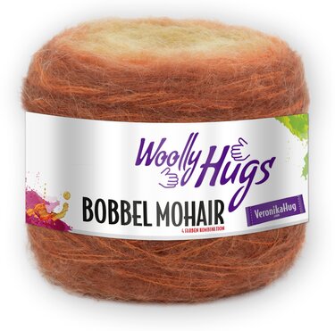 Knäuel flauschiges Bobbel Mohair-Verlaufsgarn in herbstlichen Creme-, Orange- und Brauntönen mit weißer Banderole