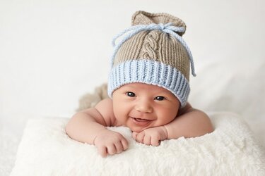 Strickanleitung Babymütze mit Zopf