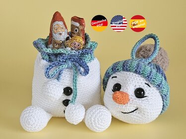 Schneemann Geschenksäckchen mit Christbaumkugel - Amigurumi Häkelanleitung