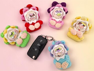 Häkelanleitung Frau Blume / Schlüsselanhänger / Taschenbaumler