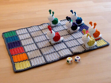 Crochet pattern for a funny family game "Snail race"