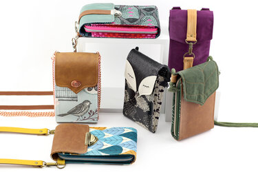 Kompakte Handytaschen mit Klappen, Reißverschlüssen und verschiedenen Trageriemen