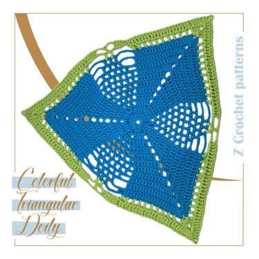 Blue crocheted triangular doily with an openwork pinwheel center and green border.