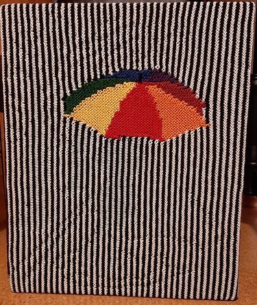 Schattenstrickbild mit buntem Regenschirm 1 / Nur für Farbwechsel-Geübte. - Stricken