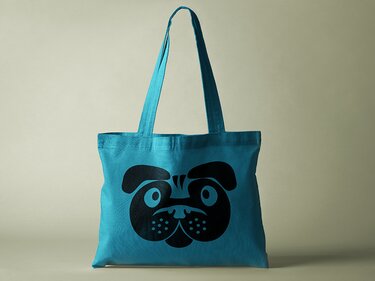 Türkisfarbene Stofftasche mit stilisiertem schwarzem Mopsgesicht