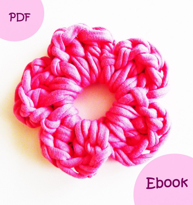 Gehäkelte Blumen-Applikation in kräftigem Pink