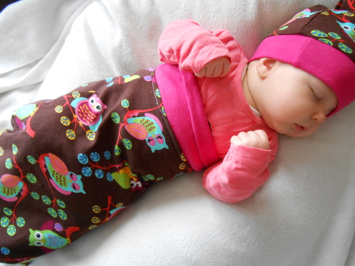 Pucksack und Erstlingsmütze