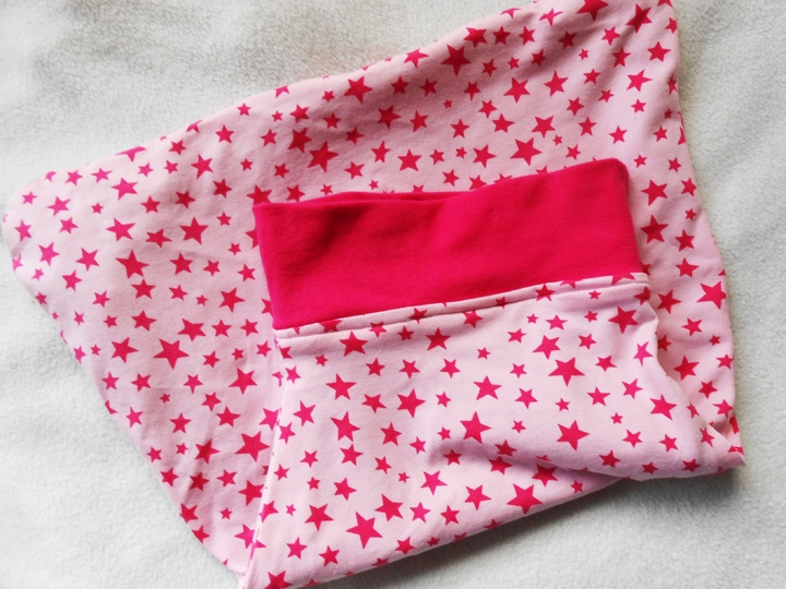 Pucksack und Erstlingsmütze