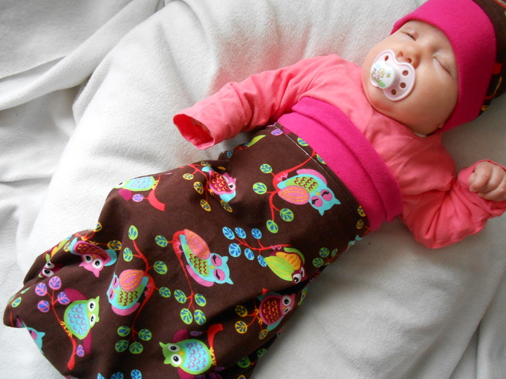 Pucksack und Erstlingsmütze