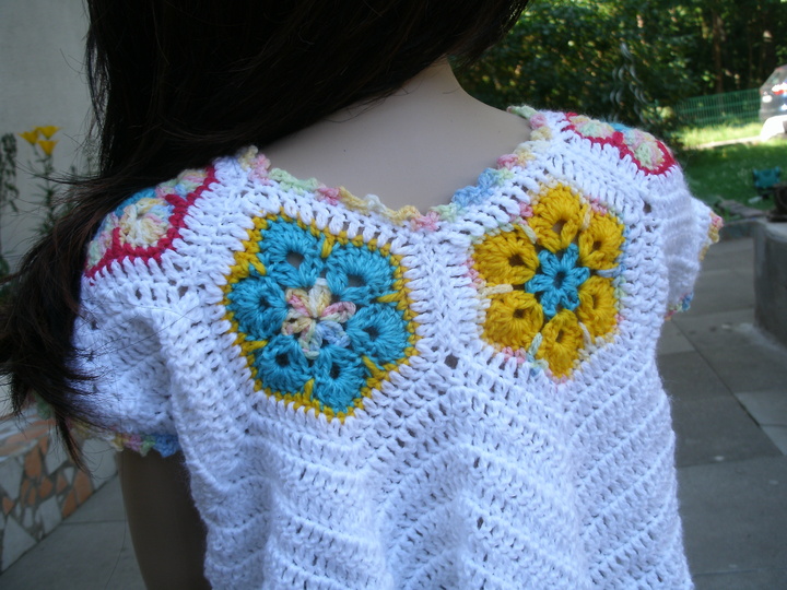 African Flower swingendes Jäckchen Häkelanleitung