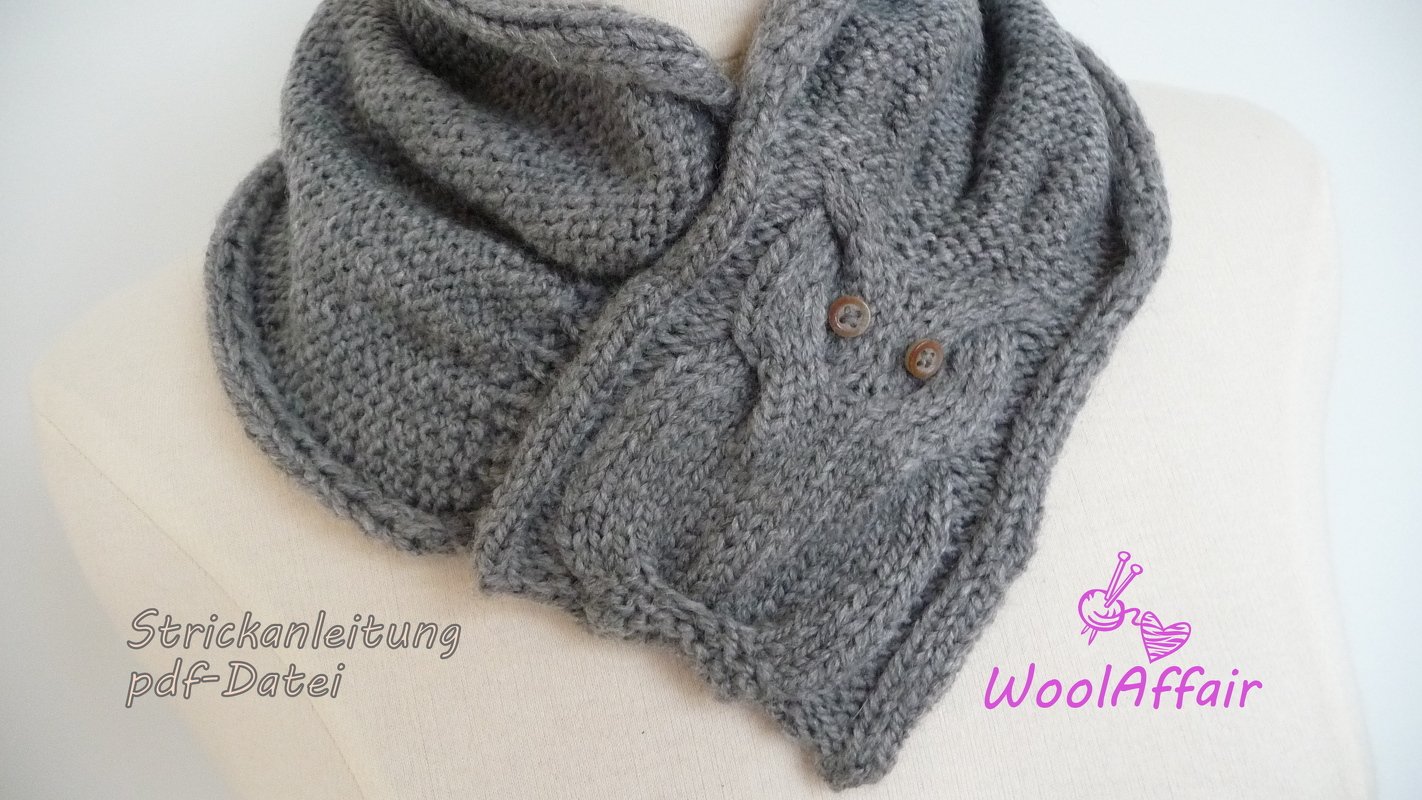 Grey knitted collar scarf with cable panel and two brown buttons on a dress form