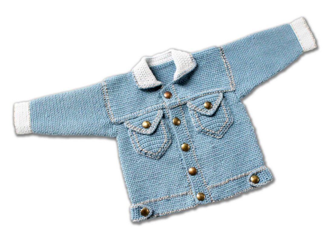 Light blue crocheted children's jacket with white collar, cuffs and brass-tone buttons laid flat