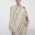Kuscheliger Poncho quer gestrickt