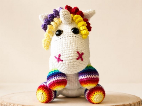 Crochet pattern for a unicorn amigurumi with rainbow mane