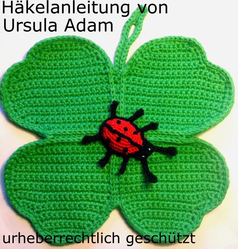 Häkelanleitung mit Zählmuster für ein Kleeblatt mit Marienkäfer als Topflappen