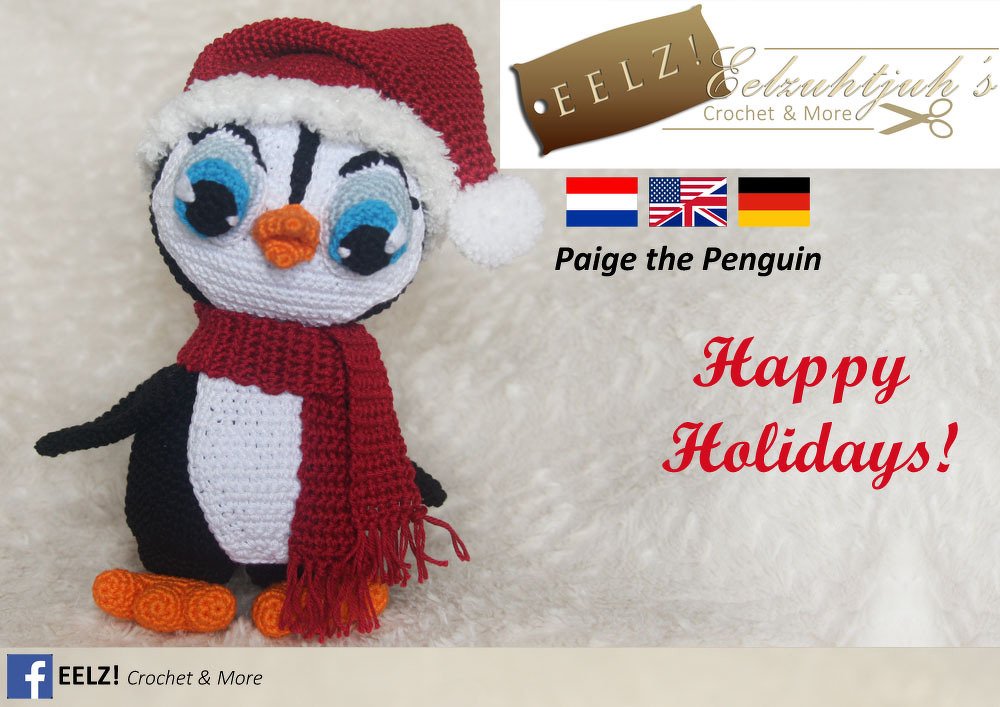 Gehäkelter Amigurumi-Pinguin mit roter Zipfelmütze und Schal auf hellem Plüschhintergrund