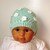 Strickanleitung Baby-Mütze mit Blütenapplikation, ca. 6 - 12 Monate, Ku 43 - 46 cm
