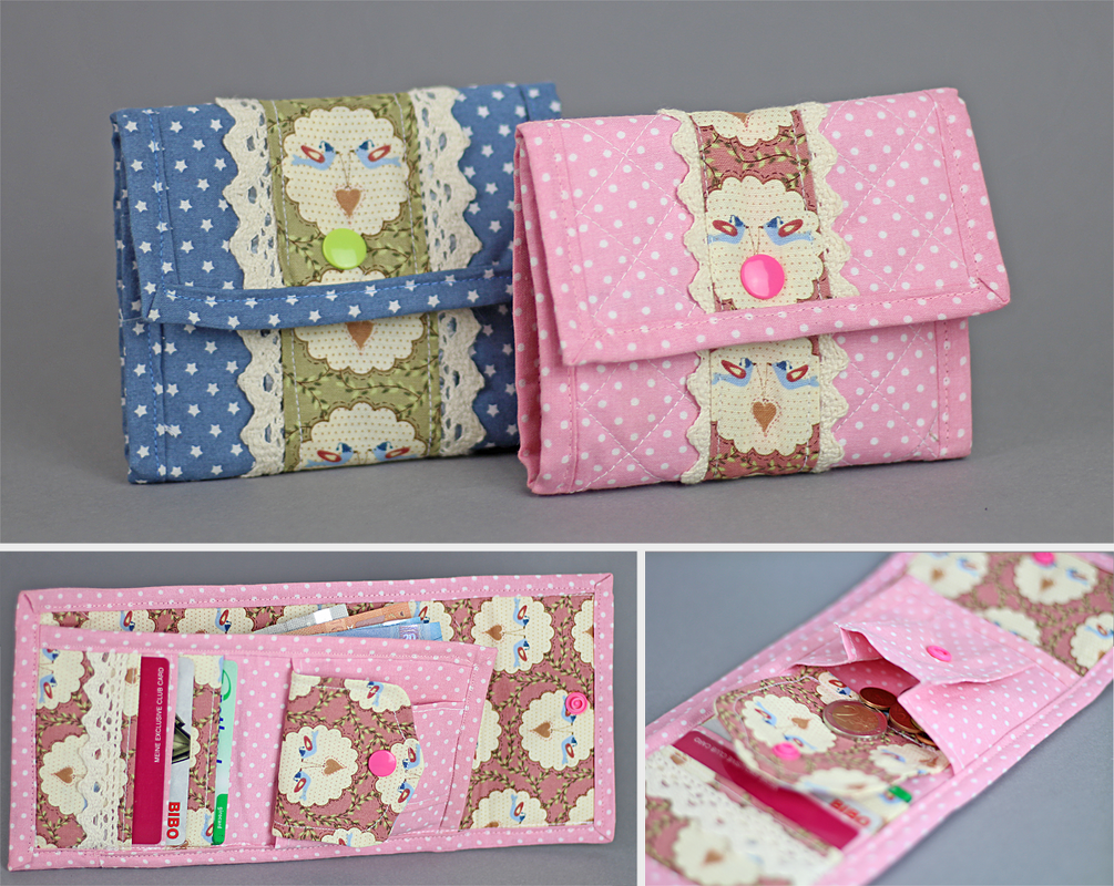 Zwei genähte Stoffportemonnaies, blau mit Sternen und Eulenapplikation, rosa mit Punkten und Eulenapplikation; rosa geöffnet mit Karten- und Münzfach.