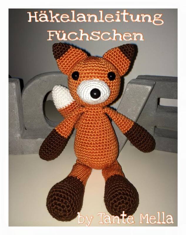 Gehäkeltes Amigurumi-Füchschen in Orange, Braun und Weiß