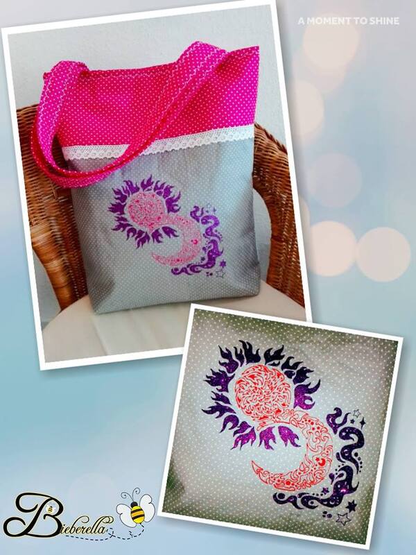 Grau gepunktete Stofftasche mit pinker Innenkante und pink‑lila Sonne‑Mond‑Plott