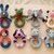 Crochet Rattle Set – 8 baby rattles with grasping ring, bundle (EN & DE)