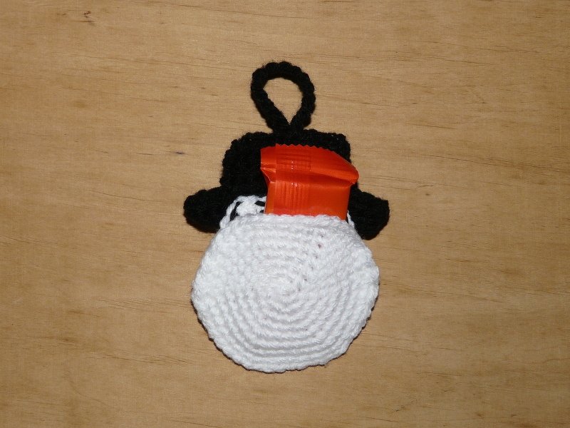 Kleines gehäkeltes Beutelchen mit Schlaufe und Einstecktasche, geeignet für Adventsfüllung