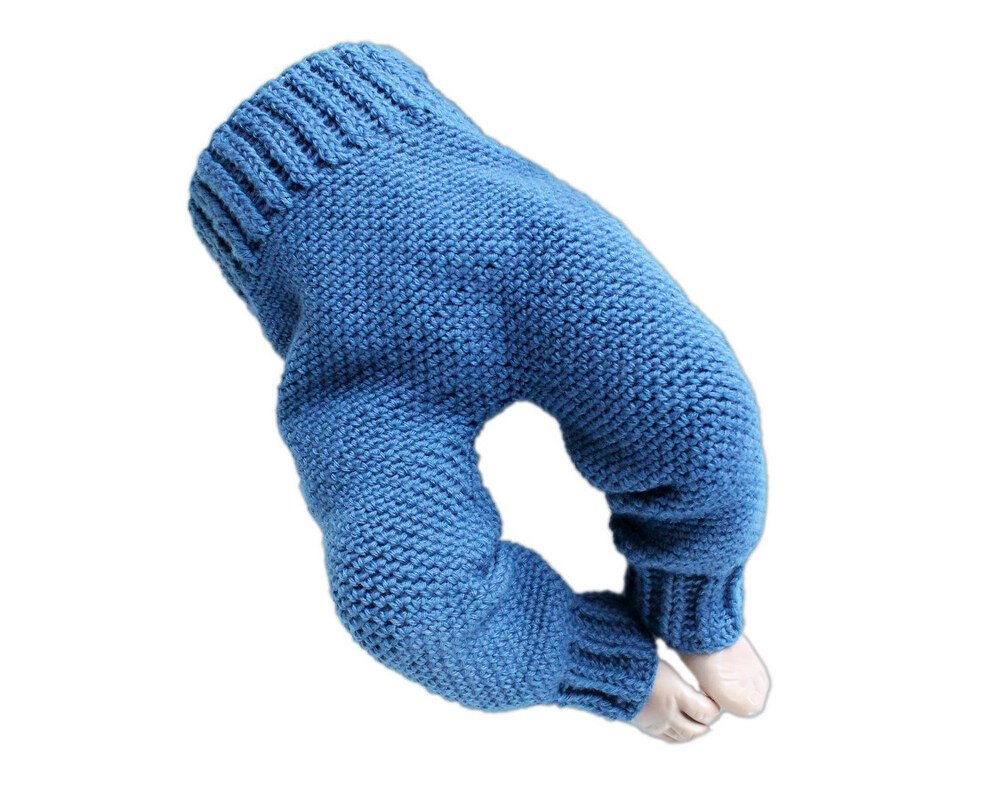 Blue crocheted baby pants with ribbed waistband and ankle cuffs