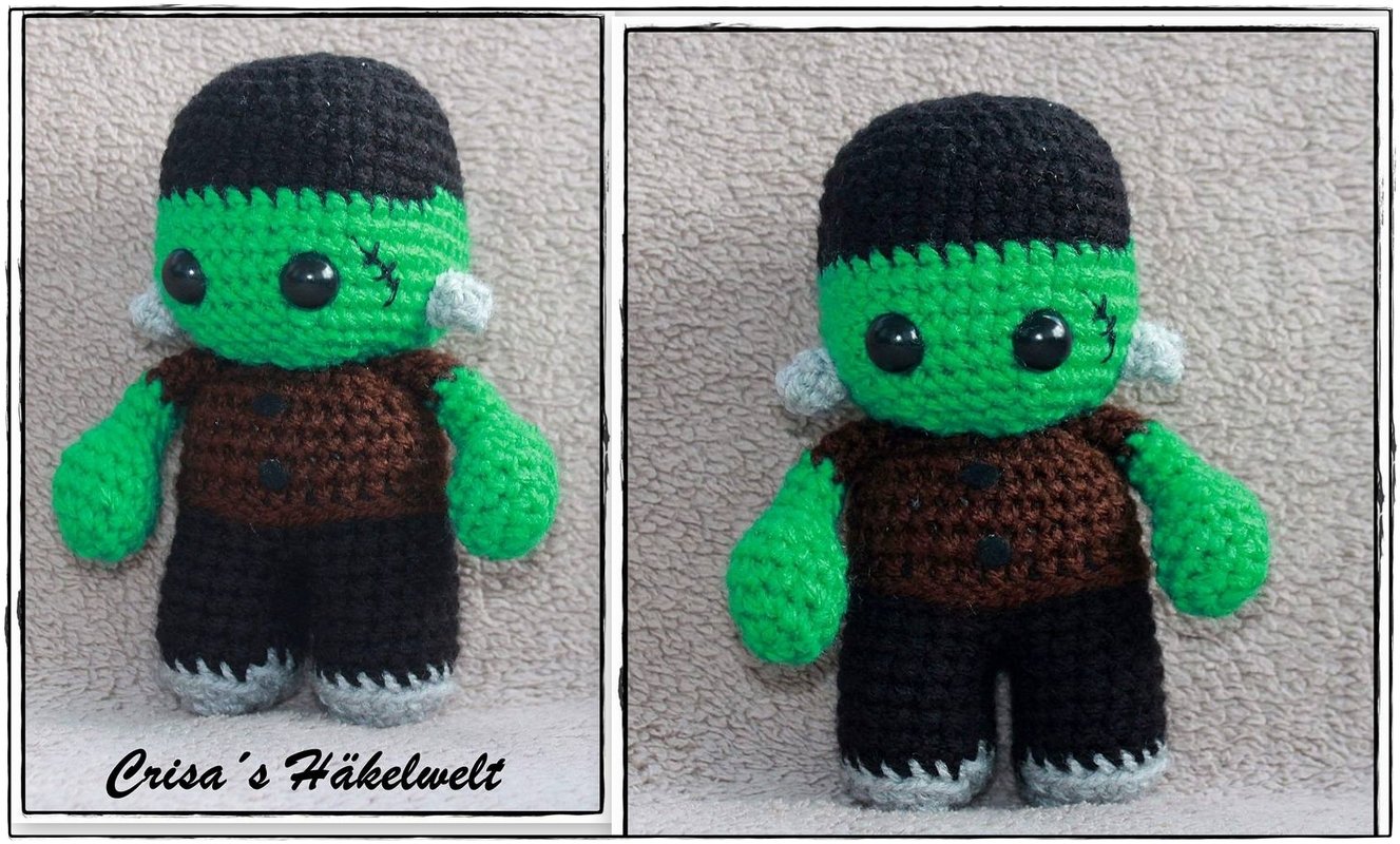 Gehäkeltes grünes Frankenstein-Amigurumi mit schwarzen Augen, braunem Oberteil und grauen seitlichen Bolzen.