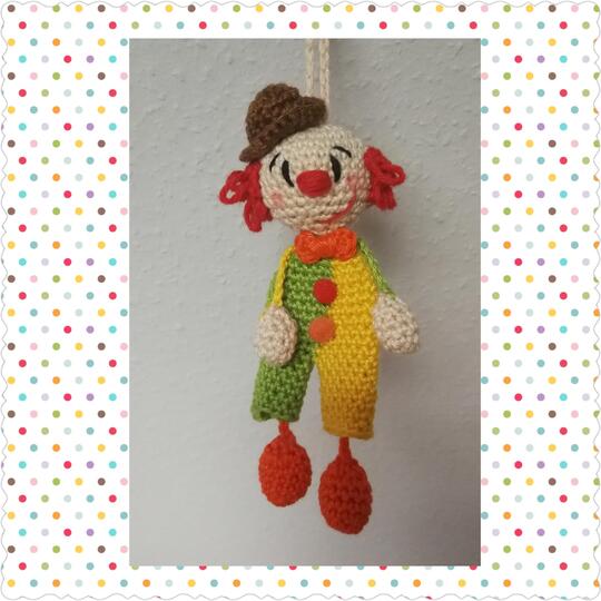 Clown Oskar als Taschenbaumler