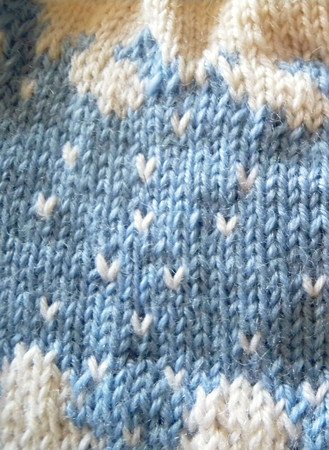 Winter Wonderland beanie knitting pattern "Snowflakes Keep Falling" in stranded colorwork