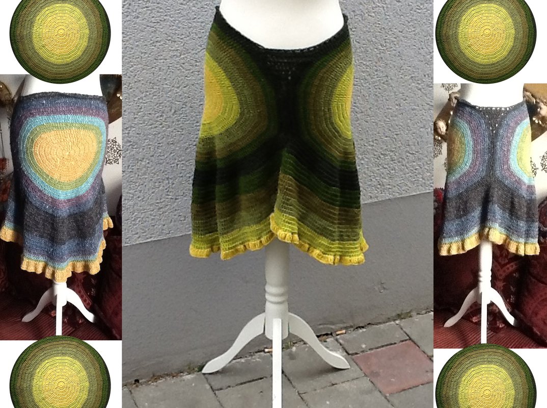 Gehäkelter Damenrock auf Schneiderpuppe mit kreisförmigem Muster, Farbverlauf in Grün, Gelb, Grau und Blau sowie gerüschtem Saum