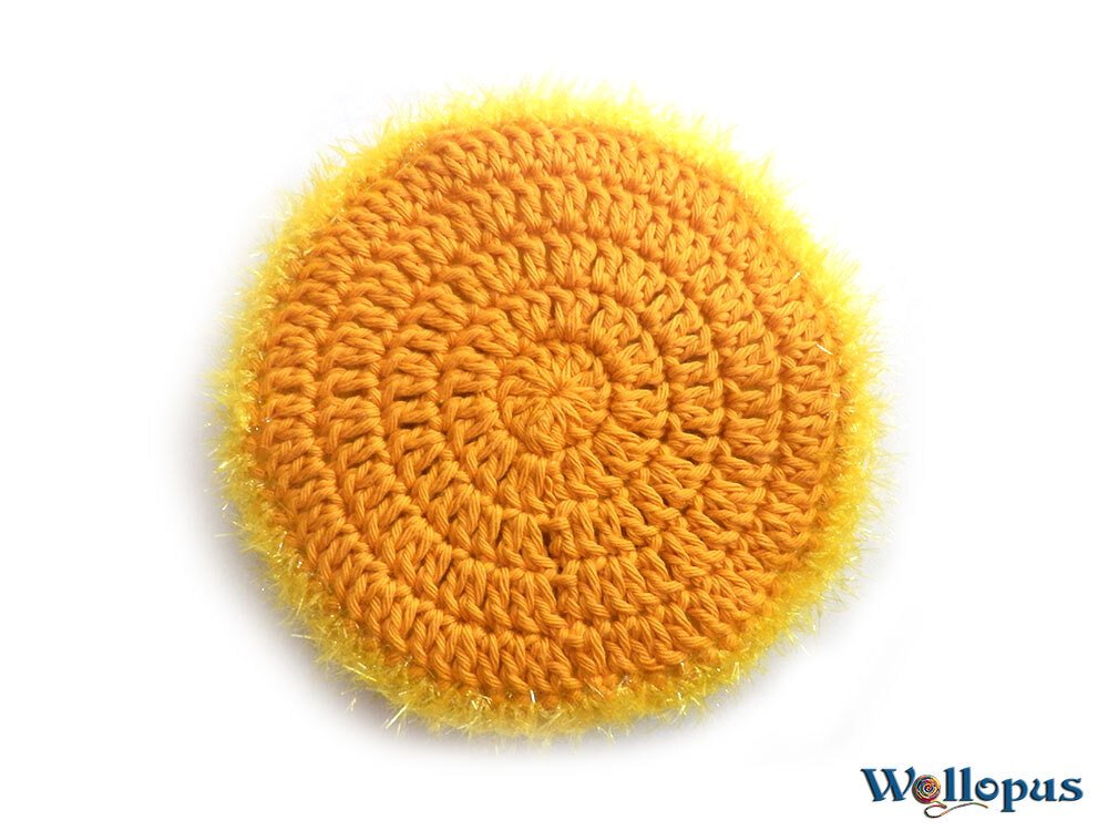 Rundes sonnengelbes Häkel-Spülpad mit weichem Rand