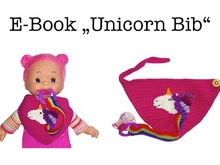 unicorn book and stuffed animal