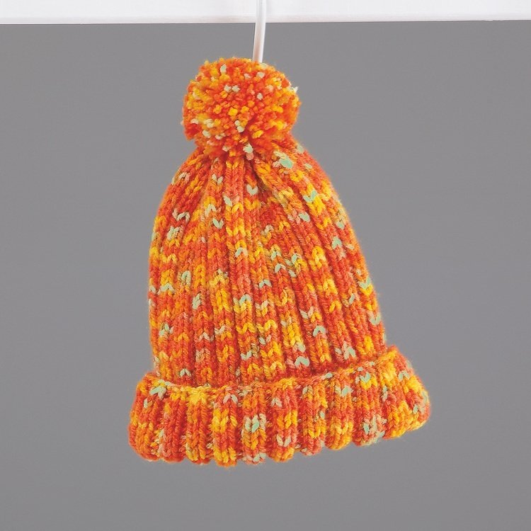 Gestrickte Kinder-Bommelmütze orange-gelb mit Umschlagbündchen