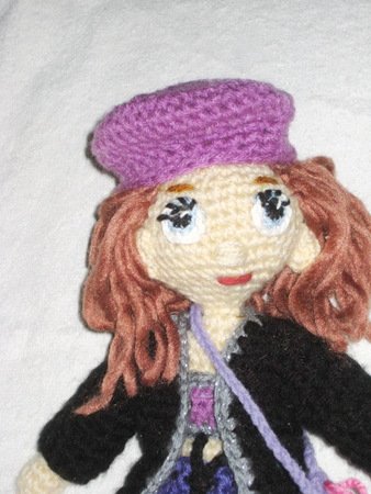 Doll with changeable clothes - crochet pattern