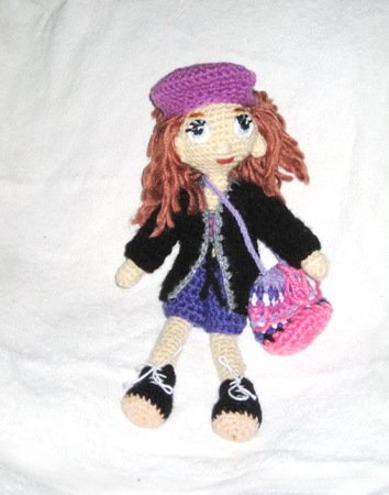 Doll with changeable clothes - crochet pattern