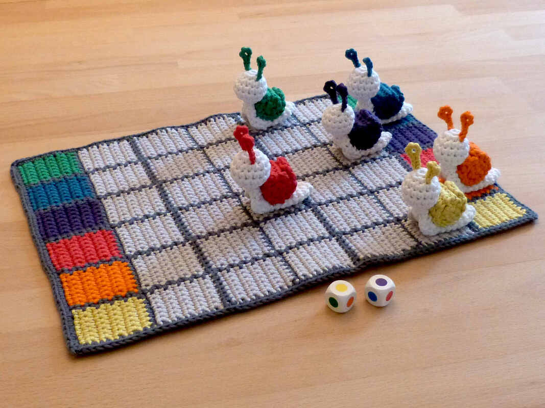 Crochet pattern for a funny family game "Snail race"