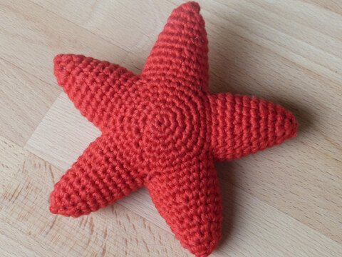 Häkelanleitung Babyrassel "Stern"