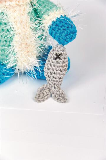 Amigurumi Eskimo mit Fisch